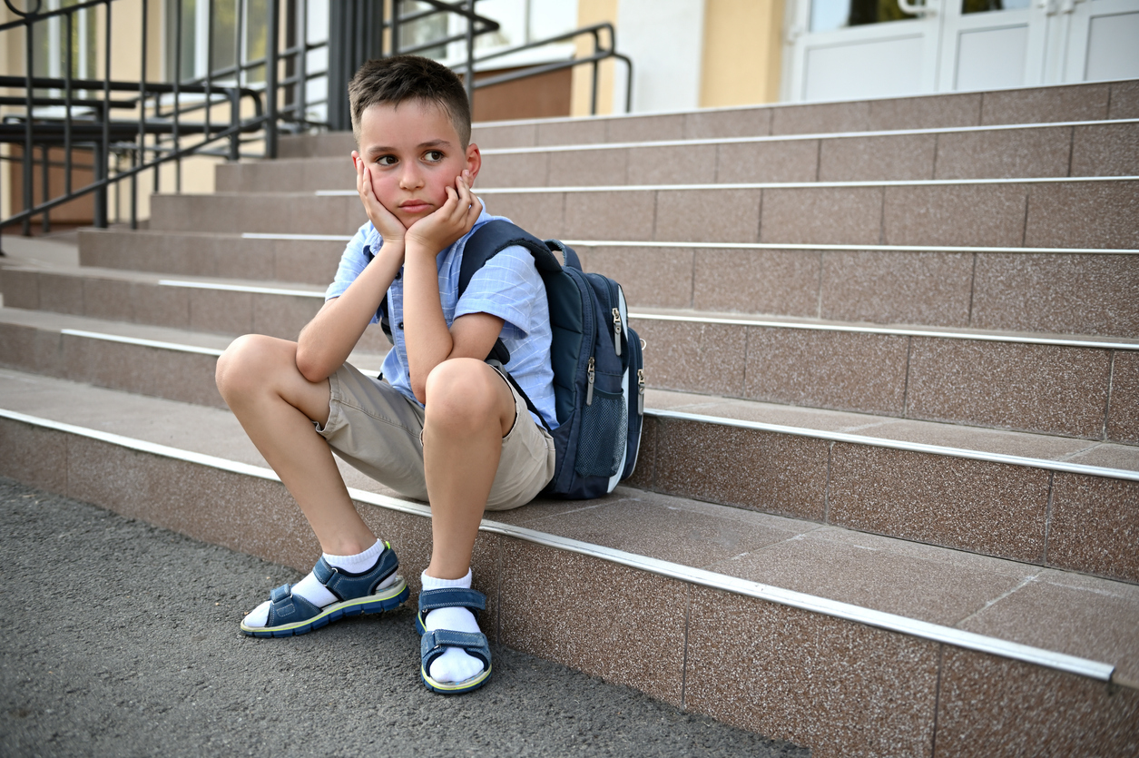 A boy thinks about bullying at school 