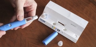 Person preparing medication injection